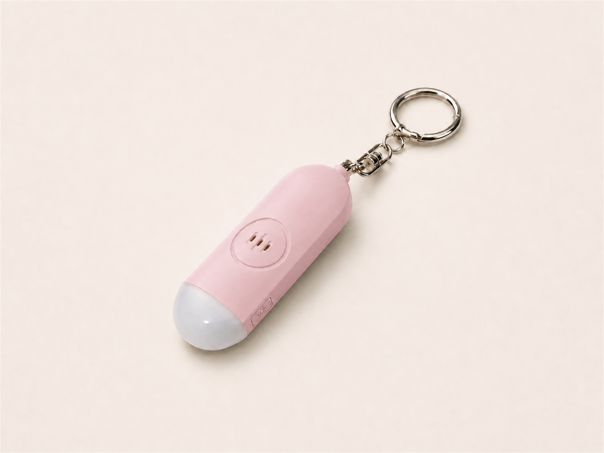 Pink Lumae personal safety alarm, back view